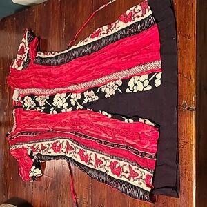 Vintage like new dress. Button detail on front and tie belt. Black lined